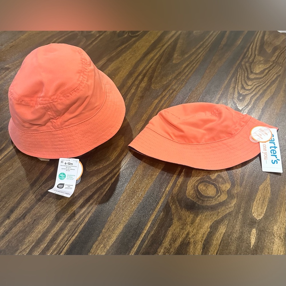 Carter's Baby Orange & navy bucket hat 6-12 months (2 hat bundle)